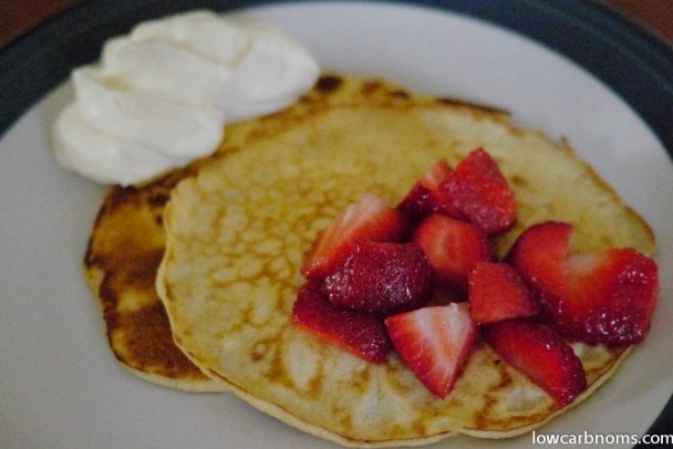 low carb cream cheese pancakes with strawberries and cream - suitable for keto, paleo, atkins diet